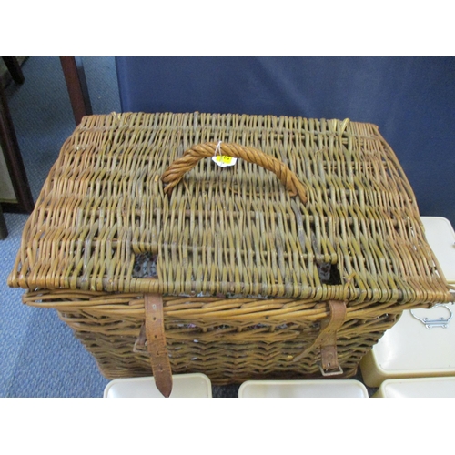 279 - A vintage wicker hamper containing six Bandalasta Sandwich boxes of various sizes, along with six li... 