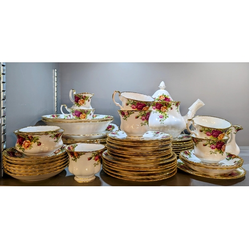 300 - A Royal Albert 'Old Country Roses' part tea/dinner service to include teapot, dishes, dinner plates,... 