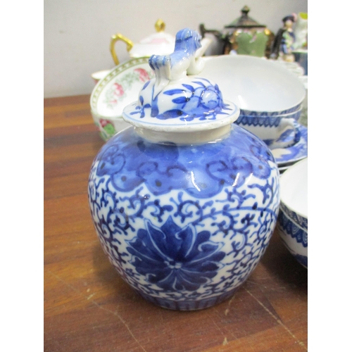 328 - A selection of ceramics to include a Royal Stafford part tea set, Chinese blue and white vase A/F, S... 