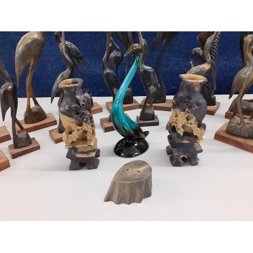 351 - A quantity of vintage Indian Buffalo horn models of herons and other birds on a treen base and other... 