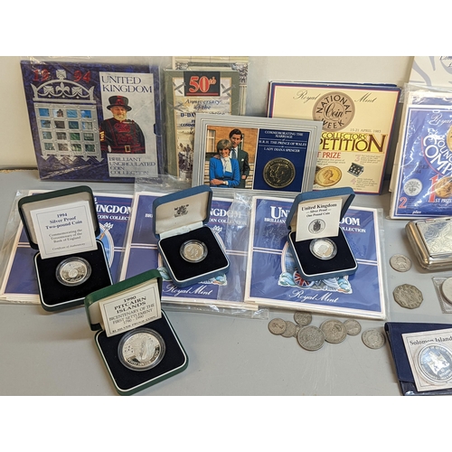 381 - A collection of silver proof coins and sets to include 1991-1995 WWII 50th anniversary set in case, ... 