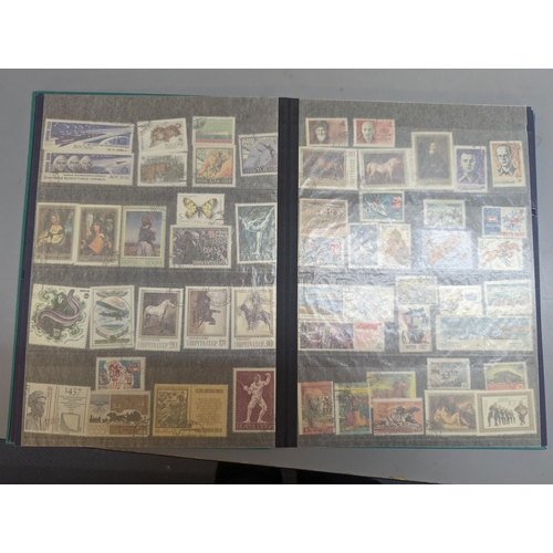 386 - A collection of World stamps in seven albums to include GB Victorian penny reds, various loose stamp... 