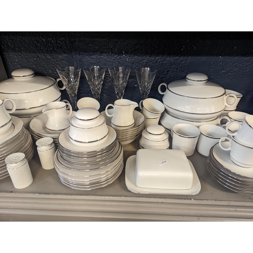 390 - An Eschenbach part dinner service to include side plates, cups and saucers, lidded dishes, cream jug... 