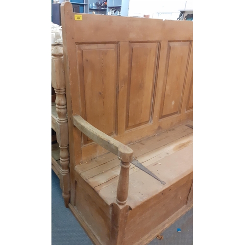 444 - An 18th century pine settle having a panelled back and hinged seat, 127cm h x 142cm w
Location: A2B