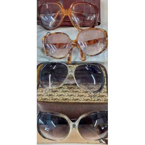 75 - Four pairs of vintage lades over-sized sunglasses to include YSL and Christian Dior together with mi... 