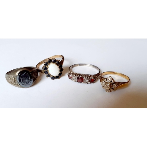 194 - An 18ct illusion dress ring, 2.18g together with a silver dress ring with red and white cabochons, t... 