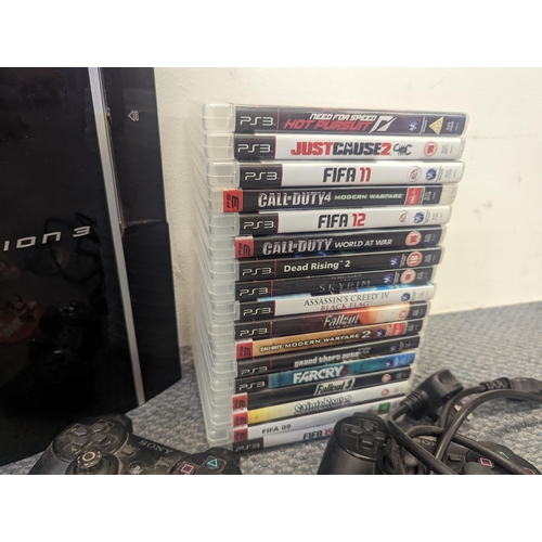 130 - A Sony Play Station 3 games console A/F, together with four controllers A/F and mixed games to inclu... 