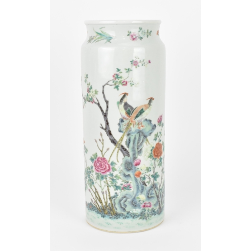 1 - A Qing dynasty Famille Rose porcelain sleeve vase, 19th century, of cylindrical form with naturalist... 