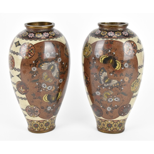 11 - A pair of Japanese Meiji/Taisho period cloisonne enamel vases, each with central goldstone ground ca... 