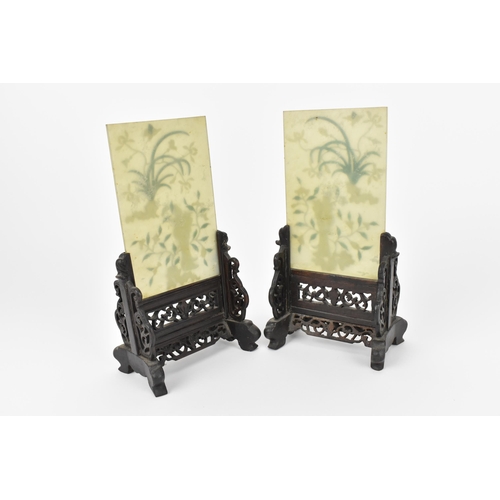 14 - A pair of Chinese jade and hardstone table screens, early 20th century, each with central vertical r... 