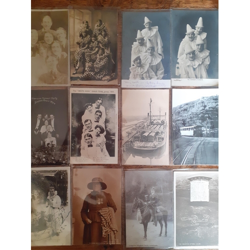 54 - A quantity of early 20th century postcards to include train and railway related scenes, pier theatri... 