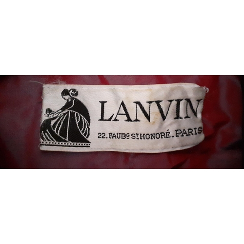 2 - Lanvin- A 1970's Couture evening gown, in a voluptuous crimson silk design specifically made for the... 