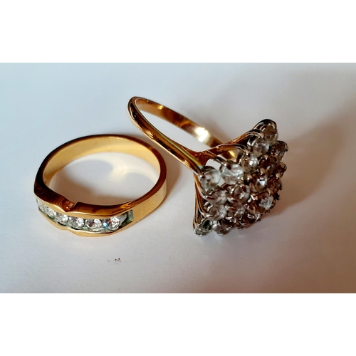 25 - A group of 7 gold tone and silver tone dress rings in different styles with various coloured paste s... 