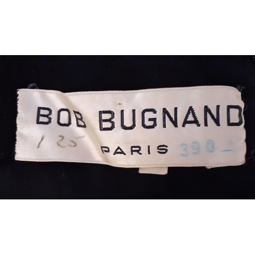 6 - Bob Bugnand, Paris- A black sleeveless cocktail dress with Paris label dating the dress between 1965... 