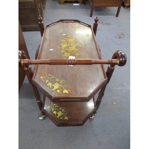 168 - A rosewood two tier trolley with large front wheels, inlaid floral brass decoration and glass tops
L... 