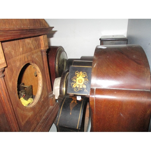 186 - The component parts of clocks and cases to include mainly early 20th century examples, three Chinois... 