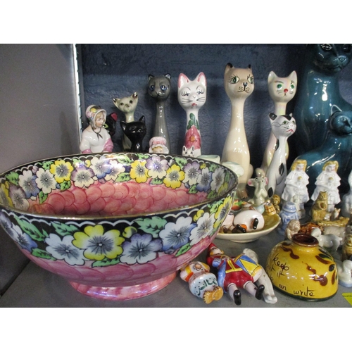 262 - A selection of ceramics to include Poole pottery cats, Wade 1st Whimsies, Maling bowl, Carlton ware ... 