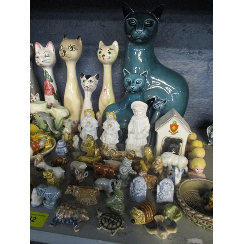 262 - A selection of ceramics to include Poole pottery cats, Wade 1st Whimsies, Maling bowl, Carlton ware ... 