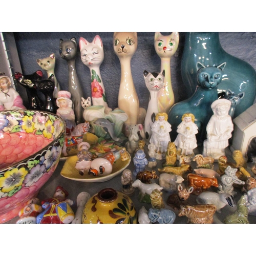 262 - A selection of ceramics to include Poole pottery cats, Wade 1st Whimsies, Maling bowl, Carlton ware ... 