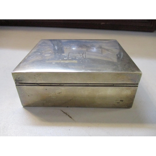 286 - An Elizabeth II silver cigarette box London 1963 marks for Garrard & Co Ltd, inscription to lid 'Fil... 