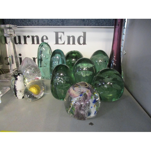 69 - A quantity of collectable glass to include a group of seven Victorian glass dump paperweights, a box... 