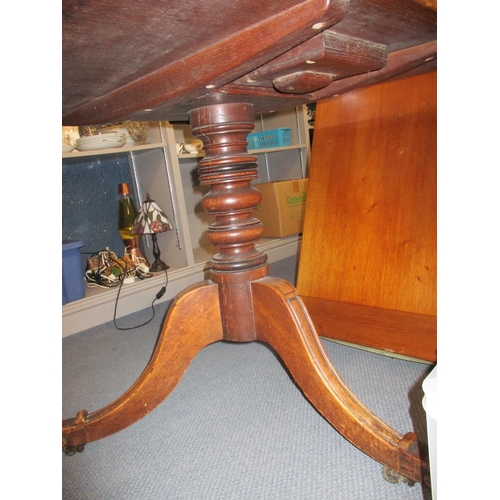 76 - A 19th century oak breakfast table, the square top with moulded round corners and edge, inlaid strin... 