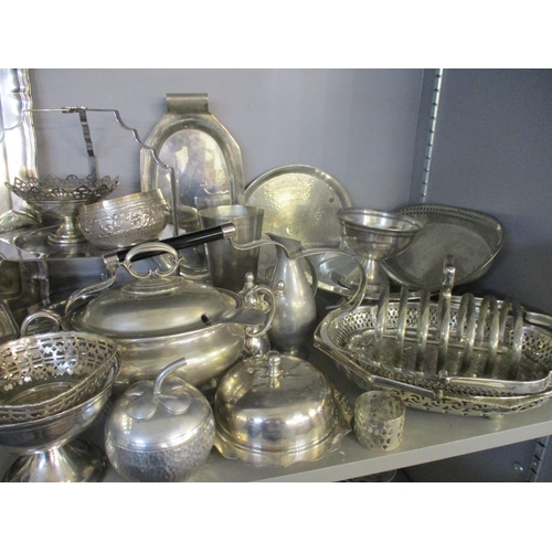 90 - A mixed selection of silver plate and white metal items to include a four piece teaset with matching... 