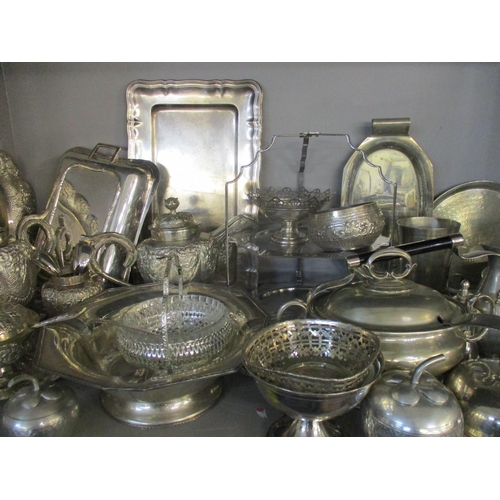 90 - A mixed selection of silver plate and white metal items to include a four piece teaset with matching... 