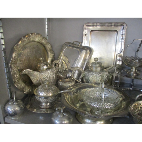 90 - A mixed selection of silver plate and white metal items to include a four piece teaset with matching... 