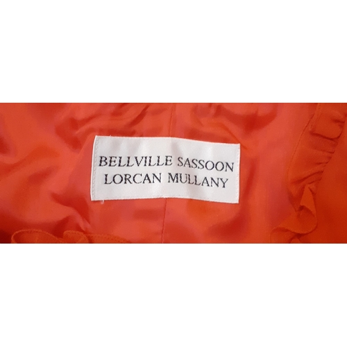 16 - A Bellville Sassoon Lorcan Mullany, red evening gown having a criss-cross ribbon design to the left ... 