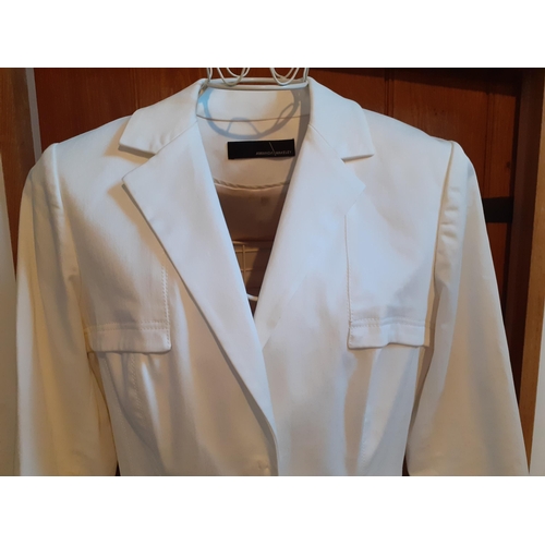 19 - Amanda Wakeley-A cream cotton formal box jacket with cream silk lining and trim, UK size 14. Locatio... 