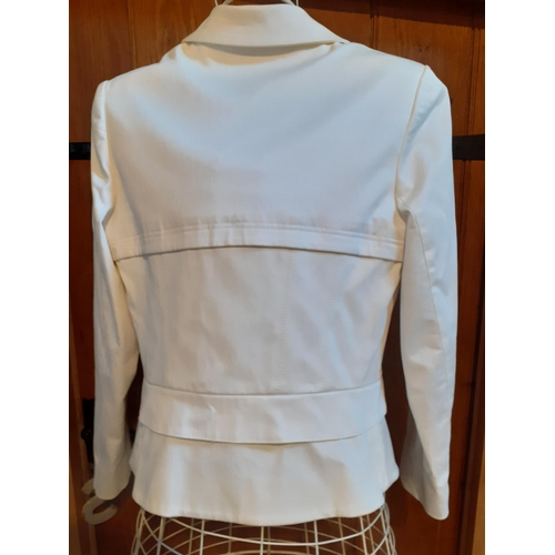 19 - Amanda Wakeley-A cream cotton formal box jacket with cream silk lining and trim, UK size 14. Locatio... 