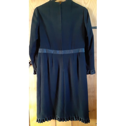 4 - Jean Patou Boutique, Paris-A late 20th Century black woollen and silk cocktail dress having a cross-... 