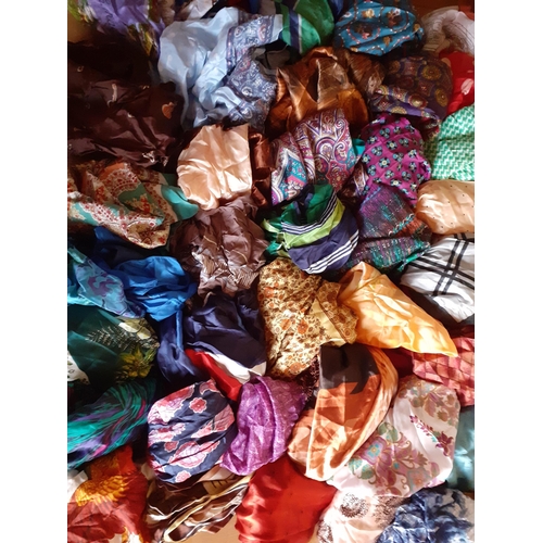 41 - A quantity of vintage fashion scarves to include chiffon and satin examples together with satin even... 