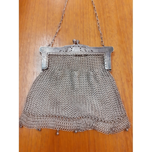 56 - A late 19th Century/early 20th Century white metal chain evening bag, 251g, together with a Victoria... 