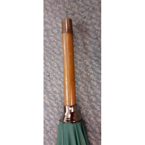 59 - An Edwardian Briggs green umbrella, Circa 1911 with incorporated racing pencil, refurbished by Brigg... 