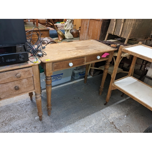 101 - Two Victorian pine desks, together with a two tier trolley
Location: G