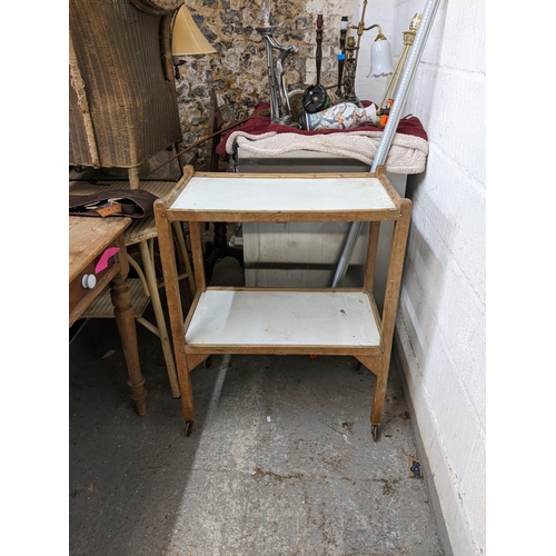 101 - Two Victorian pine desks, together with a two tier trolley
Location: G