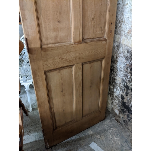 108 - A large Victorian pine, arched topped door inset with mirrored glass, 221h x 74.5w
Location: G