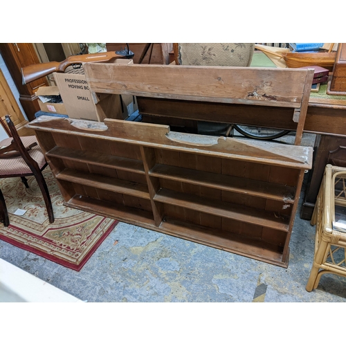 109 - Two pine bookcases to include a Victorian wall hanging bookcase
Location: G