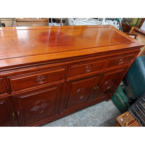 125 - A 20th century Chinese sideboard having four drawers with four drawers below, 86.5h x 152.5w
Locatio... 