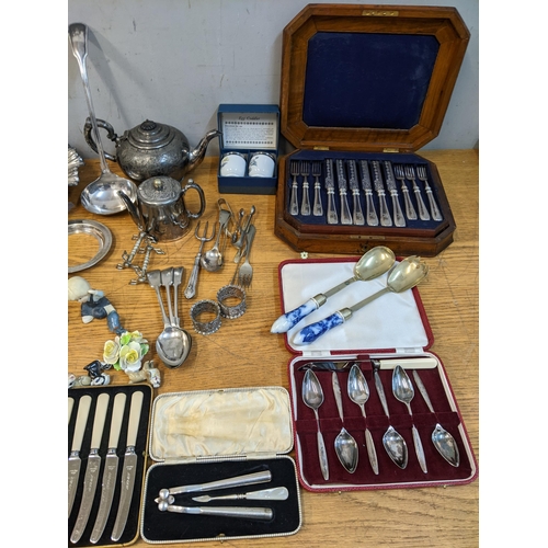 141 - Silver plate and ceramics to include a fiddle and thread pattern basting spoons and ladle, a bread b... 