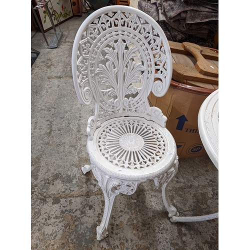 17 - An aluminium garden white painted table, together with two matching chairs
Location: G