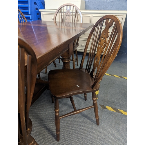 187 - A reproduction stained oak refectory extending dining table 259cm w (when extended) x 75.5cm h x 91c... 