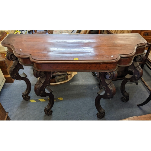 220 - A Victorian mahogany hall table having a single drawer and four scroll shaped legs 93cm h x 160cm w ... 