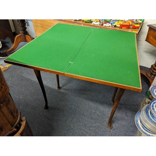 226 - An early 20th century walnut fold over card table, 76cm h x 76.5cm w
Location: RWM