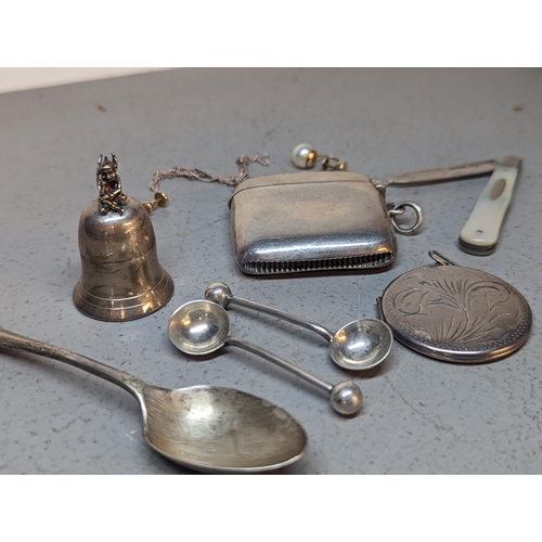 315 - Silver to include a vesta, condiment spoons, a fruit knife, a pill pot in the shape of a bell
Locati... 