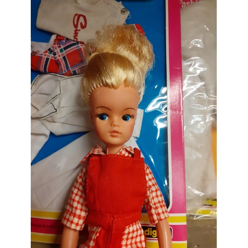 329 - A 1980's Sindy doll in original box with clothing accessories
Location: R2.2