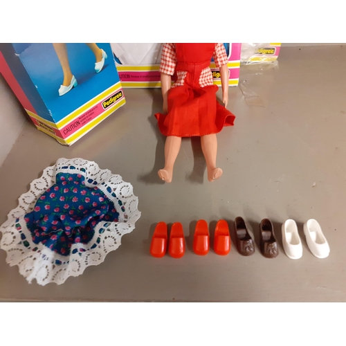 329 - A 1980's Sindy doll in original box with clothing accessories
Location: R2.2