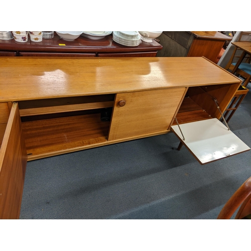 348 - A 'Younger' John Herbert teak retro sideboard, 74c, h x 214cm w
Location: BR